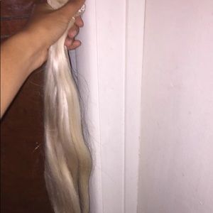 Blonde hair extensions
